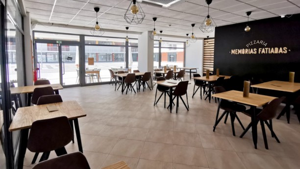 Pizzaria Memórias Fatiadas Vista da sala