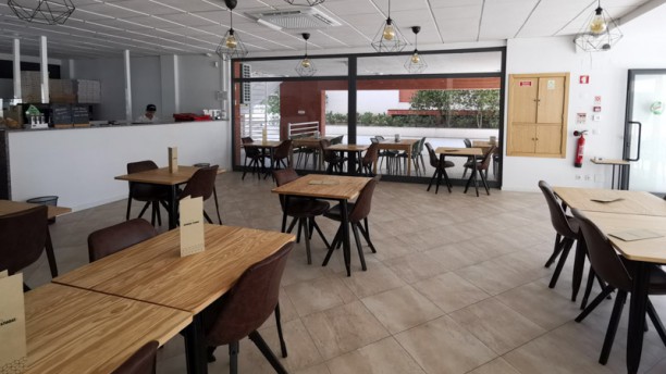 Pizzaria Memórias Fatiadas Vista da sala