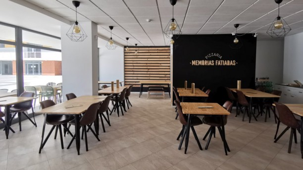 Pizzaria Memórias Fatiadas Vista da sala