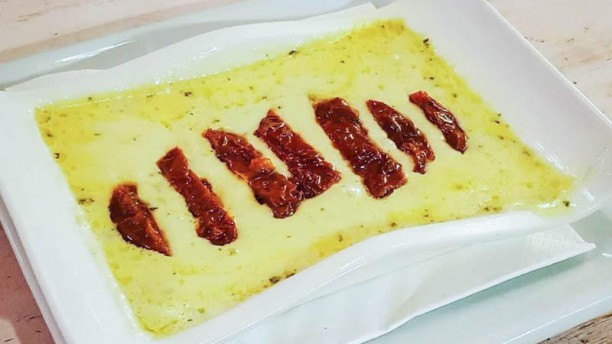 El Pessic Timbal de quesos fundidos con tomates secos